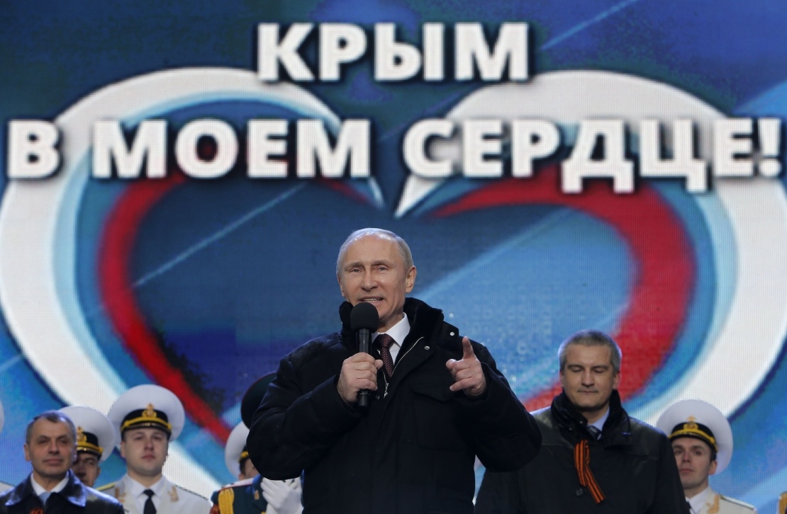 Путін під час мітингу та концерту із назвою «Ми разом» на підтримку приєднання українського Криму до росії, Москва, 18 березня 2014 року.