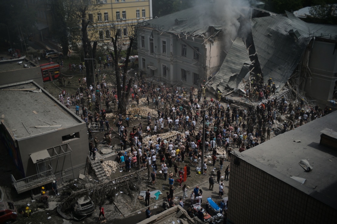 Hit on Okhmatdyt. Civilian, military and rescue workers are sorting through the debris.