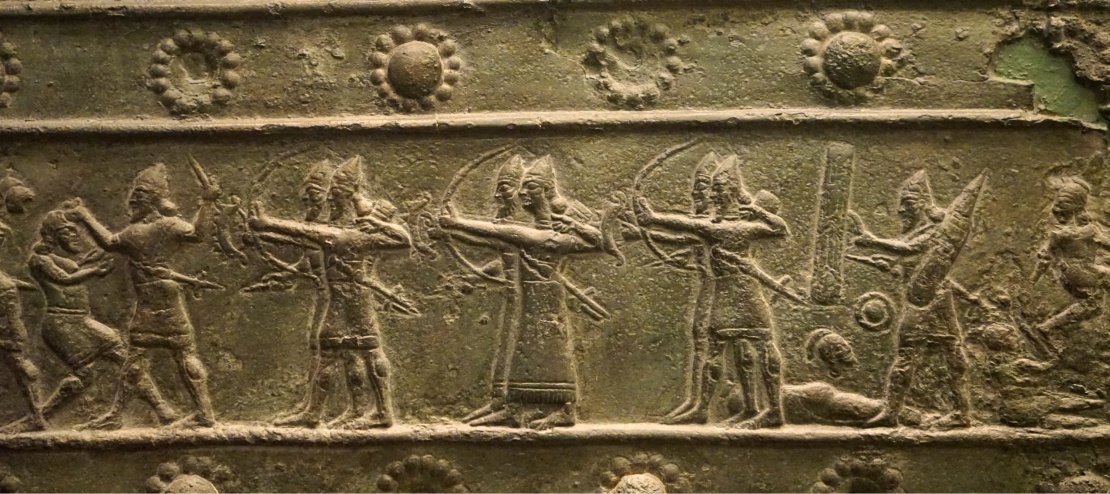 Battle scene of Assyrian soldiers, engraved on a bronze plate, 9th century BC.