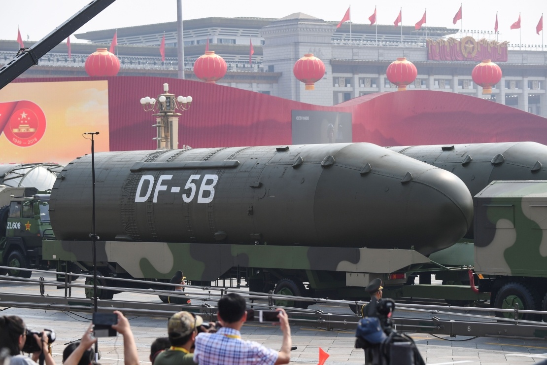 The US Department of Defense estimates Chinaʼs nuclear arsenal at 500 warheads, the third largest in the world. Pictured: Military vehicles carrying DF-5B intercontinental ballistic missiles take part in a military parade in Tiananmen Square in Beijing in 2019.