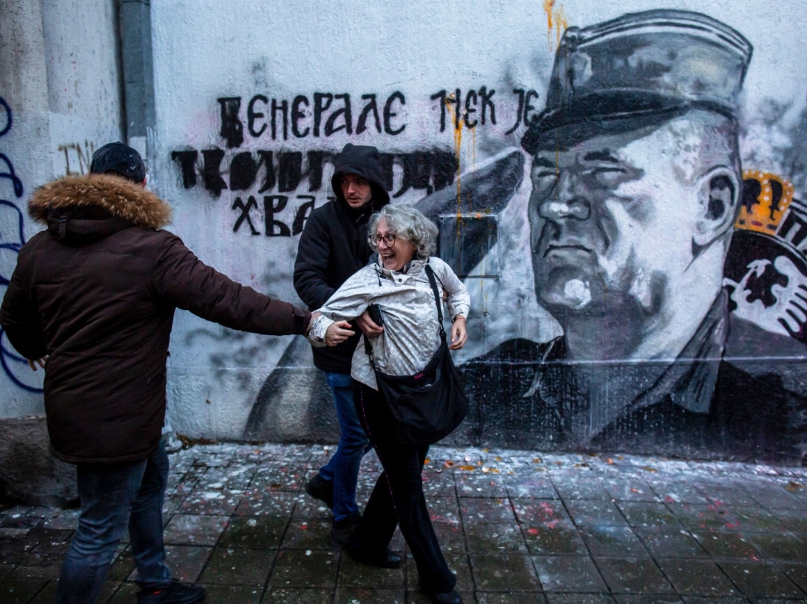 In November 2023, Serbian human rights defender Aida Korovic, together with other activists, tried to paint a mural of Ratko Mladic. The mural was created in 2021 on one of the houses in Belgrade — a month after Mladicʼs conviction. On the day of the action, the mural was guarded by Serbian law enforcement officers. They detained Korovic when she threw several eggs at the mural. She was accused of violating public order. The court fined Korovic $900. Activists collected money, but the law enforcement officers said that she did not pay the fine, and therefore she should serve her sentence in prison.