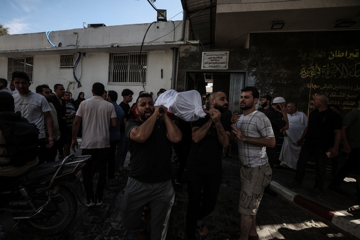 Bodies of slain Palestinians are brought to a morgue in Gaza City, October 7, 2023.