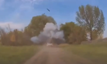 In Vovchansk, a Russian FPV drone hit a police car during an evacuation