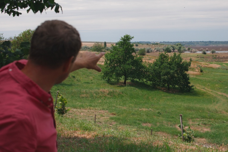 Oleksandr points to the road along which the Russian tanks were moving.