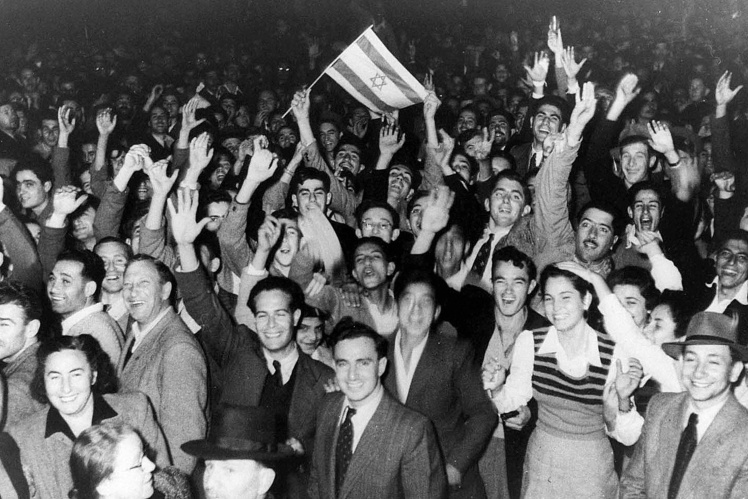 Jews in Tel Aviv celebrate the adoption of the UN resolution on the partition of Palestine, November 29, 1947.