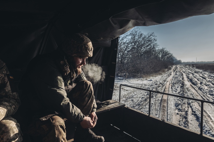 A Ukrainian military man drives a truck near Bakhmut, January 8, 2023.