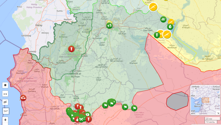 Green is the territory controlled by the opposition, and red is the Assad regime.