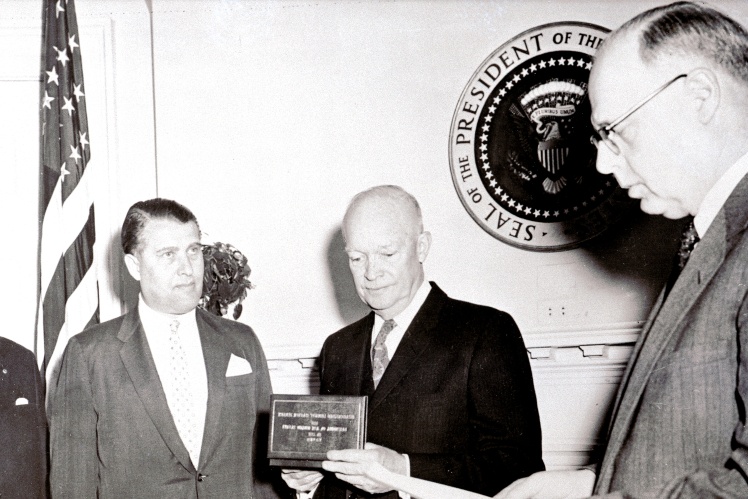 Wernher von Braun receives the Presidential Medal for Distinguished Public Civilian Service from then-Chief of the White House Dwight Eisenhower, 1959