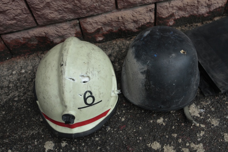 Punctured plate carriers and fire helmets of rescuers who were affected by the impact on March 15, 2024.