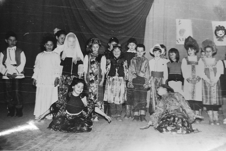 Lerane (bottom left) in a Crimean Tatar costume at a school holiday.