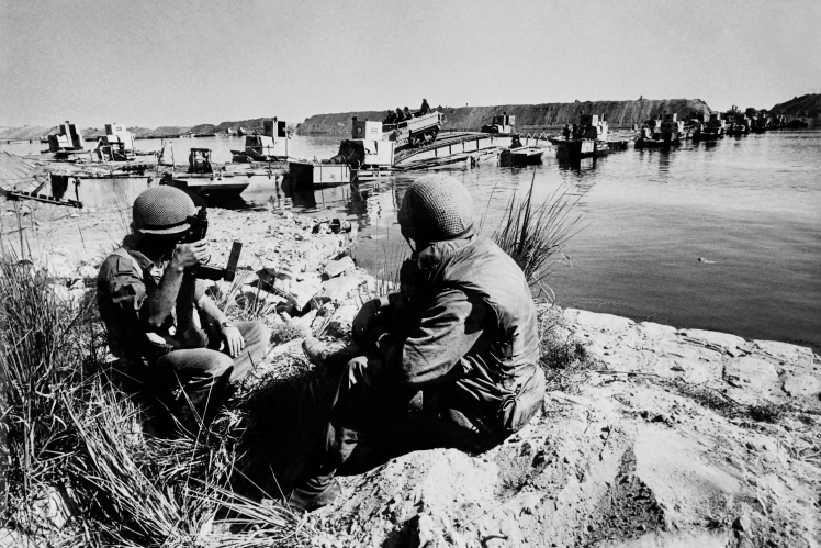 Israeli troops cross to the Egyptian side of the Suez Canal, October 20, 1973.