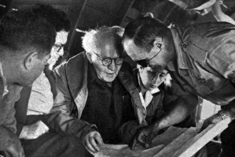 David Ben-Gurion in a military plane discussing the plan of action of the Israeli army during the Suez Crisis, 1956.