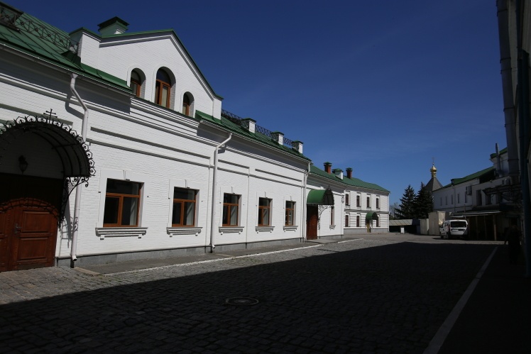 The "Monastery Cellar" is located in the Household Yard of the Lower Lavra, next to the "Brotherʼs Building" with cells. On one side, the cellar has one floor with an attic, but on the side of the slope there are two floors.