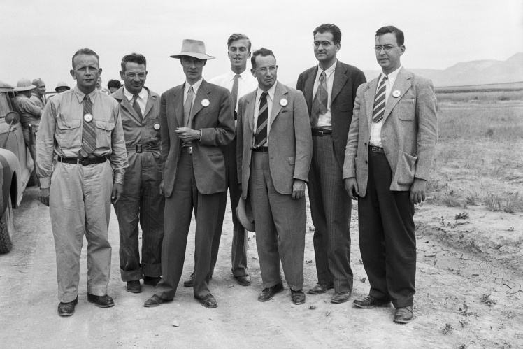 Robert Oppenheimer (third left) among Manhattan Project scientists in the New Mexico desert, 1940s.