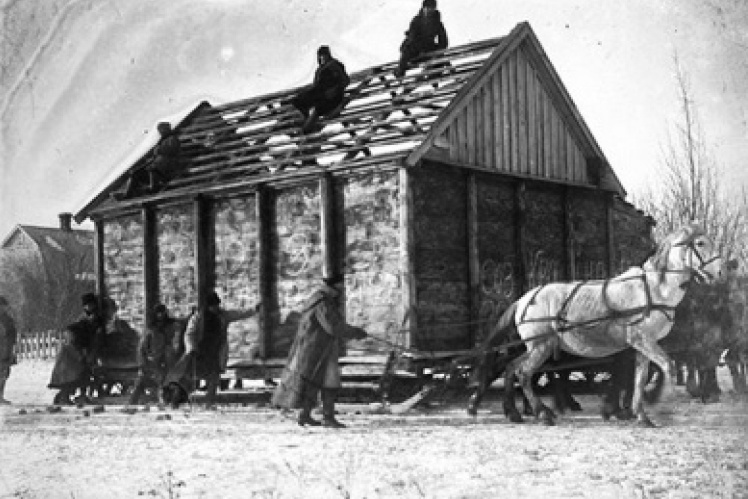 Members of the society for joint cultivation of the land transport the pantry of the dispossessed peasant P. Yemets to the general pantry, Hryshyne district of the Donetsk region, 1930s of the 20th century.