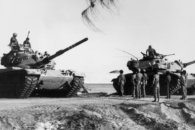 Israeli tanks return to the east bank of the Suez Canal under the truce agreement with Egypt, January 1974.