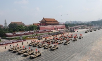 A military parade took place in China. What weapons did Xi brag about to Putin?
