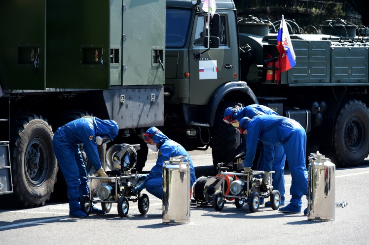Russian soldiers prepare to sanitize a nursing home in Bergamo, April 11, 2020.