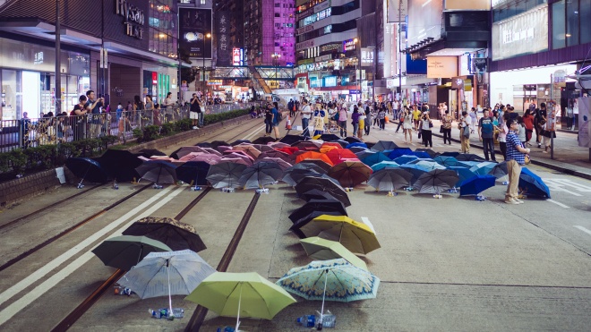 Активистов Революции зонтиков, которые требовали честных выборов в Гонконге, признали виновными в нарушении публичного порядка