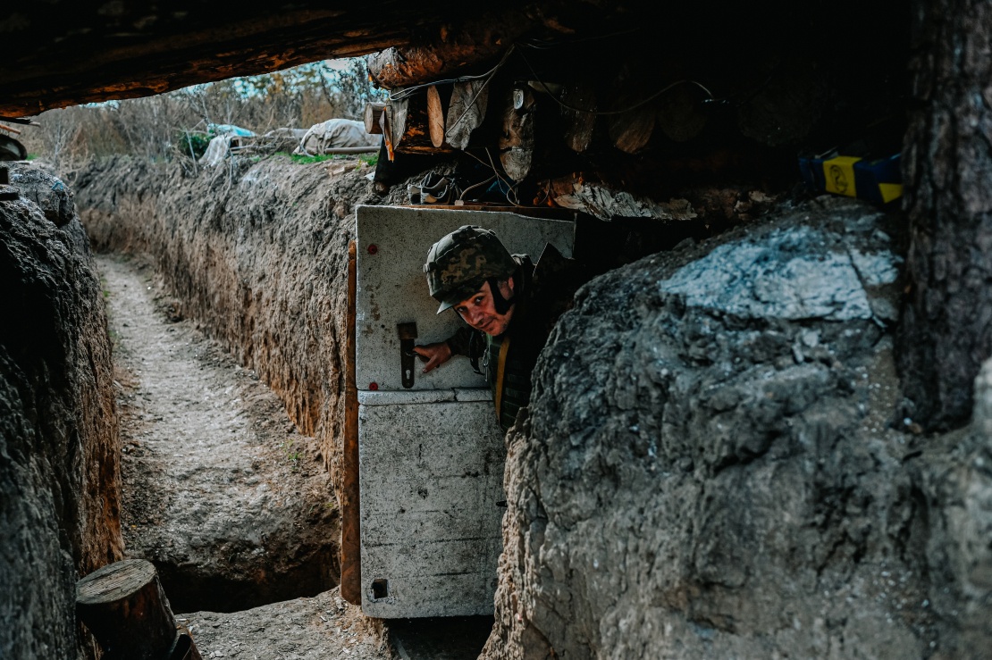 Ukrainian military personnel in a dugout near one of the villages of the Kherson region.