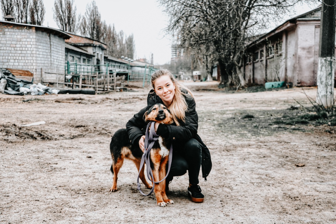 Katya Levyk and a rescued dog from Borodyanka.