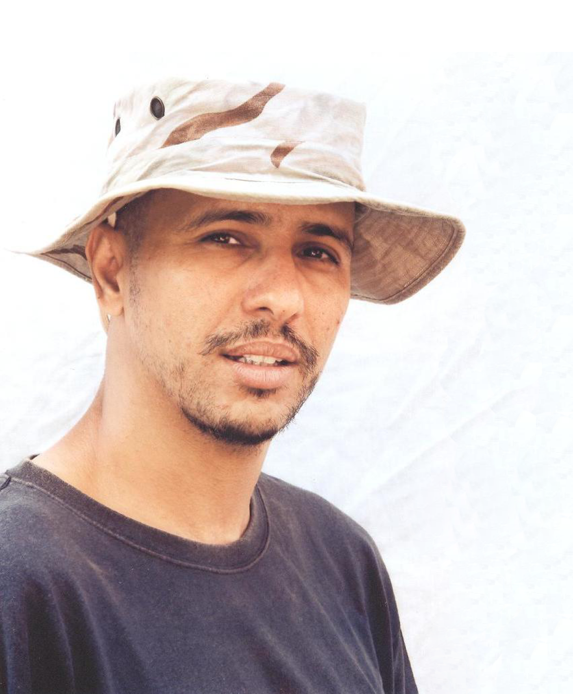 Слахи мохаммад. Мохамед ульд. Мохамед ульд. Мохамад слахи. Мохамед ульд.