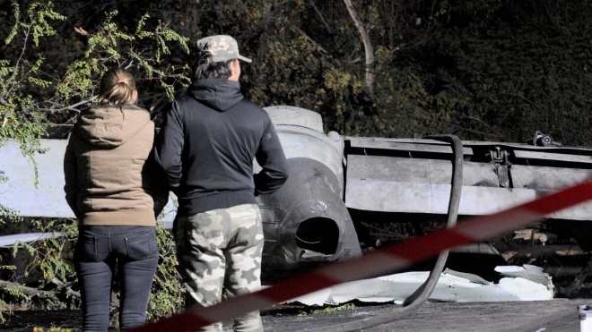 Спасатели завершили работы у места падения самолета Ан-26 в Харьковской области
