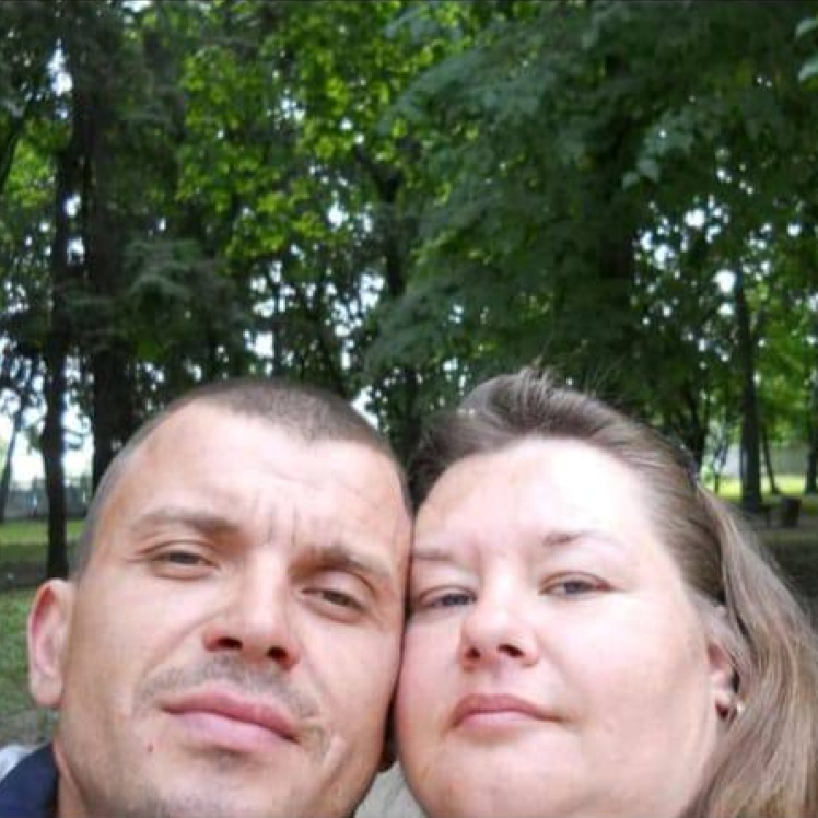 Dmytro with his wife.