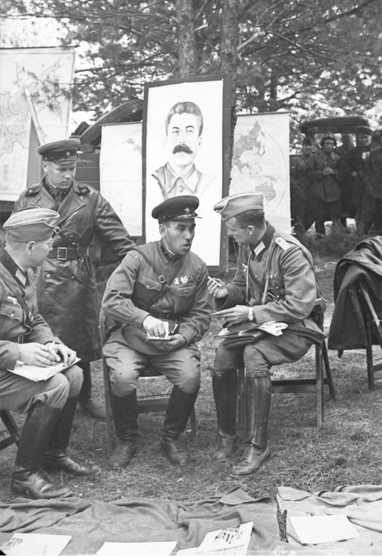 The German and Soviet command discuss the details of holding a joint parade in Brest under the portrait of the head of the USSR Joseph Stalin, September 22, 1939.