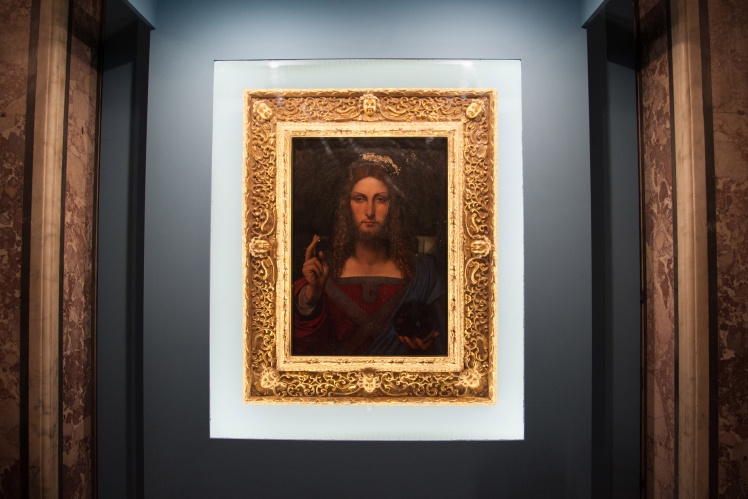 Картина «Спаситель мира» Леонардо да Винчи на выставке в Неаполе, 11 января 2017 года.