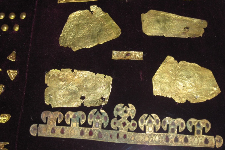 Hun diadem and gold plates that adorned clothes, weapons, and horses.