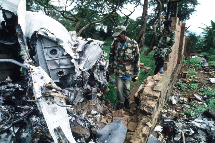 A Rwandan soldier looks at the wreckage of the plane in which the countryʼs president Juvenal Gabyarimana was flying